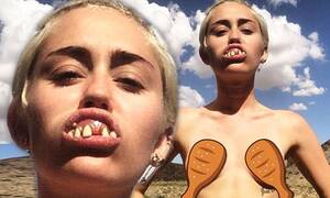 Miley Ray Cyrus Porn Fakes - Topless Miley Cyrus models new line of fake teeth in bizarre Instagram snap  | Daily Mail Online