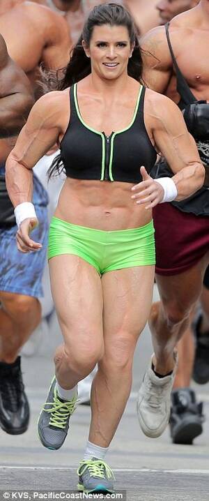 Danica Patrick Porn - Danica Patrick displays bulky frame to film Super Bowl commercial... but  it's just a muscle suit | Daily Mail Online