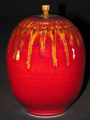 Copper Red - Tom Turner, porcelain bottle, Copper red oxblood glaze with teadust and  iron glazes.