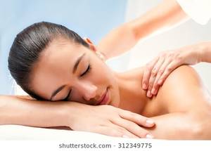Massage Doctor Schoolgirl - Close up of Young woman enjoying spa treatment. Therapist doing  manipulative massage on shoulders.