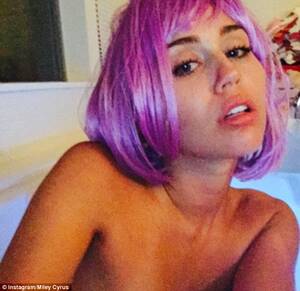 Miley Cyrus Fake Porn Captions - Miley Cyrus topless in a purple wig in yet another raunchy Instagram snap |  Daily Mail Online