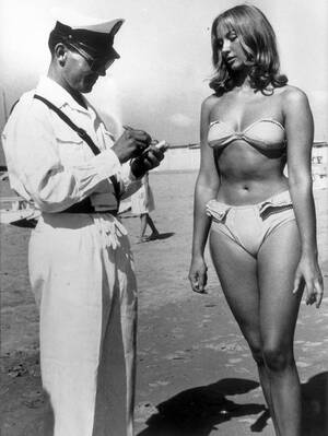 boner nude beach shots - A police officer issuing a woman a ticket for wearing a bikini on an  Italian beach 1957 . : r/pics