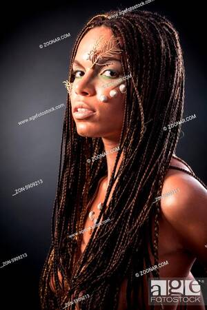 african american ghetto girl nudes - Portrait of a beautiful naked young african american woman with dreadlocks  hair on a black..., Stock Photo, Picture And Rights Managed Image. Pic.  ZON-5909213 | agefotostock