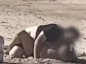europe beach sex - Couple confronted after having sex on packed public beach