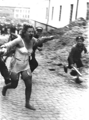 Nazis Stripping Women Porn - Young German boys with wooden clubs chase a battered and bloodied Jewish  woman during the Lviv pogroms 1941 [717Ã—970] : r/HistoryPorn