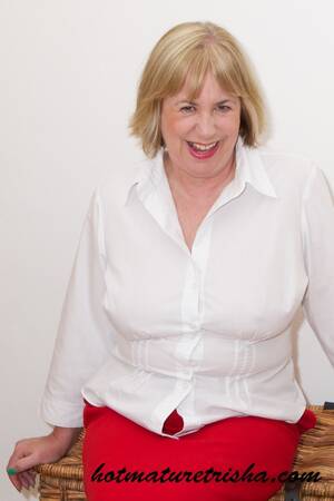 Mature Blouse Porn - Old blonde chick takes off her white blouse then bares her mature breasts  before she strips