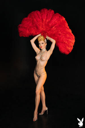 Burlesque Porn Art - Miss Miranda poses in a burlesque costume and feather fans