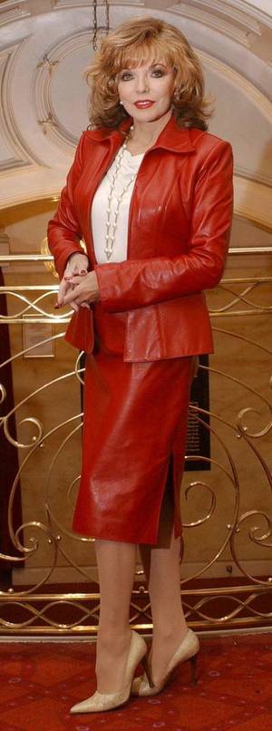 antique erotica joan collins - Miss Collins in red leather sexy as ever.