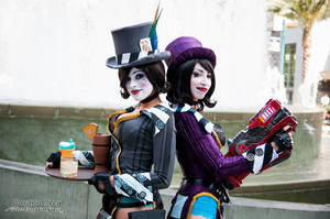 Borderlands 2 Mad Moxxi Porn Captions - Mad Moxxi (left, in grey outfit) and Mad Moxxi (right, in purple outfit)  from Borderlands 2 â€œ Cosplayers: