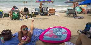 beach mother naked - Legal nudity at nude beaches gets the go ahead in Florida Senate committee