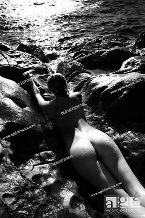 filipino lady naked on beach - Filipino young nude woman lying on stomach in water on rocky beach, Stock  Photo, Picture And Royalty Free Image. Pic. BLD-U27229674 | agefotostock