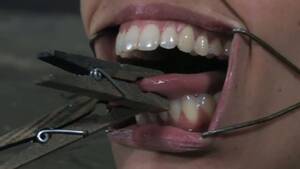Mouth Dental - Skanky Latin doxy gets her nose holes and mouth widened with BDSM gadgets