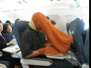 In Airplane - How to discreetly watch porn on a plane. : r/funny