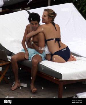 Melissa Theuriau Body Xxx - Exclusive!! Jamel Debbouze and his adoring wife Melissa Theuriau spend a  romantic day by the pool cuddling and kissing. The new parents, who had a  son on 3 December 2008 called Leon,