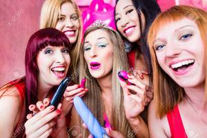 Bachelorette Sex Toys - Women having bachelorette party with sex toys in night club
