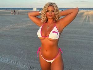 naked lindsay lohan miami beach - Page 3 babe gets 'hot' at the beach as she tops up her tan in tiny swimsuit  - Daily Star