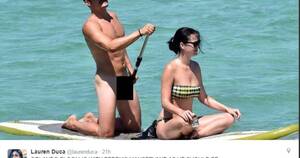 nude beach action shots - Orlando Bloom naked on a beach with Katy Perry