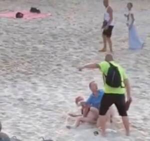 naked public beach vedeo - Randy couple romp on beach before bather smacks flip flop on man's bottom |  The Sun