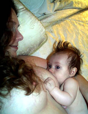 lactating cleavage - Cute baby boy drinking the milk of his beautiful Mother's breast