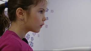 Littl Girl Looking At - Little girl's Christmas gift had pornography instead of video game