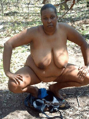 ghetto mother nude - Naked Black mother on the big motorcycle. Photo #4