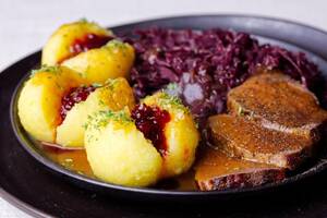 German Food Porn - German red cabbage with roast beef and potato dumplings topped with  lingonberry jam. : r/FoodPorn