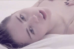Miley Cyrus Christmas Porn - Miley Cyrus' Racy 'Adore You' Video Leaks Online