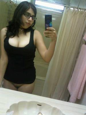 Nerdy Indian Porn - Here is a really sexy and busty indian nerdy babe. She's taking self pics  of herself in the bathroom topless and naked. This sexy amateur indian girl  has ...