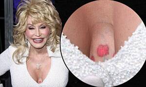 Dolly Parton Xxx Porn - Dolly Parton reveals new flower tattoo nestled between her bosom at Joyful  Noise premiere | Daily Mail Online