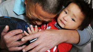 nude asian babies - Wang Bangyin breaks down as he hugs his rescued son at a welfare center for  children