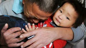 nude asian babies - Wang Bangyin breaks down as he hugs his rescued son at a welfare center for  children