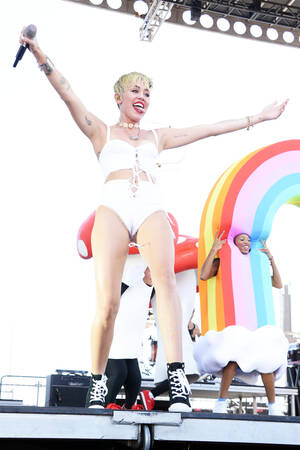 Miley Cyrus Katy Perry Porn - Miley Cyrus Dances with Little People, Defends Stage Antics: 'It's What My  Heart Is Telling Me To Do'