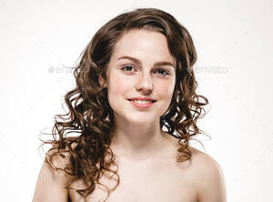 naked chicks with curly hair - Beautiful woman curly hair portrait freckles face closeup nude nature,  studio isolated on white Stock Photo by kiraliffe