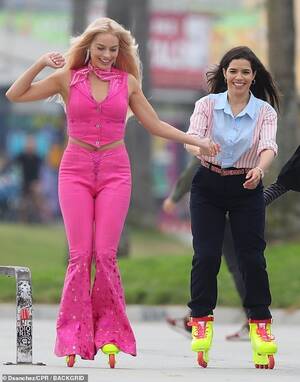 America Ferrera Porn - Margot Robbie inline skates while hand-in-hand with America Ferrera on LA  set of Barbie movie | Daily Mail Online