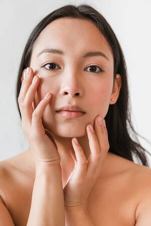 asian beautiful face nude - Free Photo | Young asian brunette touching face with naked torso