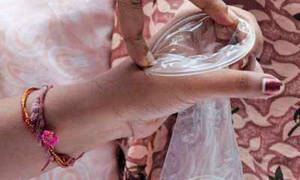female condom - Female condom demonstration/AFP