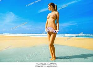 nude beach girl videos - Nude girl at the beach holding a fish, Stock Photo, Picture And Rights  Managed Image. Pic. EXA-A50818 | agefotostock