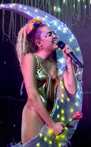 Miley Cyrus 2014 Porn Fakes - Photos from Miley Cyrus' Wildest Concert Pics
