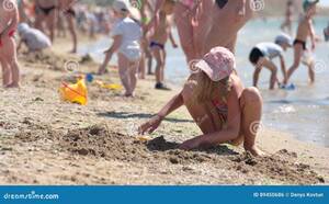 nude beach girl videos - Little Girl is Playing in the Sand on the Beach. Stock Footage - Video of  beautiful, lifestyle: 89450686
