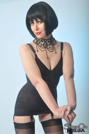 black hair and stockings - Middle aged woman with black hair poses in sexy stockings and smokes a  cigarette