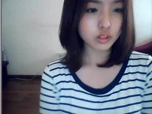 korean babe masturbating - Lovely Korean girl masturbates on webcam
