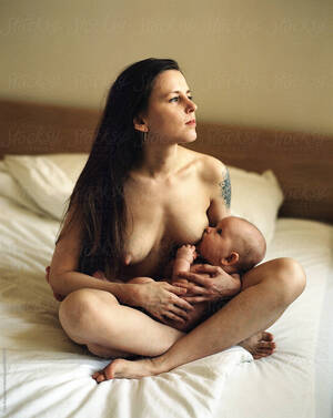 naked mothers lactating - Naked Mother Breastfeeding Her Child\
