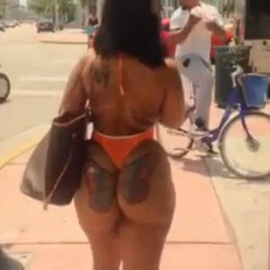big booty black chick public - Big black ass with butterfly tattoo on the street VIDEO