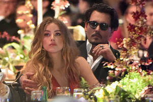 Johnny Depp Porn - Johnny Depp and Amber Heard look sad