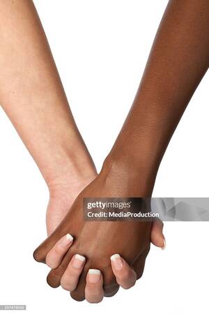 interracial couples holding hands - Interracial Couple High-Res Stock Photo - Getty Images