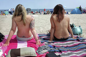 free beach party topless - Topless beachgoers: Let us free the nipple