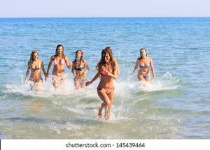 beach nude girls - Group Six Girls Running Sea Stock Photo 145439464 | Shutterstock