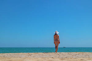 adult beach nudist image gallery - Young Girl On Nude Beach In Spain Photograph by Cavan Images - Fine Art  America