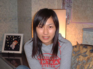 naked amateur asian - And a lot more naked amateur Asian chicks like the one below can be found  there too. Click on pictures to enlarge.