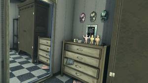 No More Heroes Porn - Dresser drawer with some figures on top.